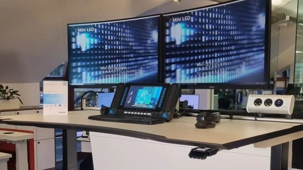 "Professional day trader workspace with multiple monitors"
